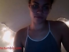 mixed girl sucks on her dildo and teases