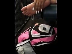 Public feet: Hot chic in airport playing with her own feet